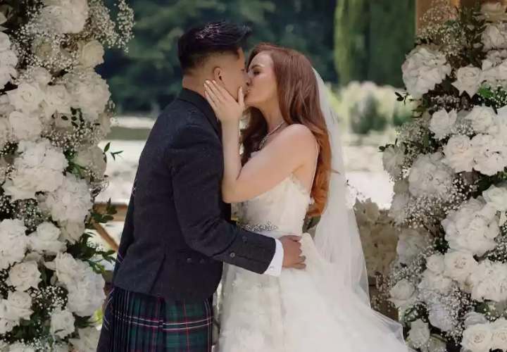 British singer Red married musician Mark Angels on July 17. (PHOTO: VIA PEOPLE, OLEGS & RITA PHOTOGRAPHY)