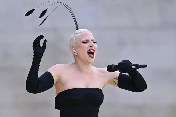 Lady Gaga performs at the 2024 Olympic Games opening ceremony on July 26, 2024 in Paris. (PHOTO: VIA PEOPLE, SINA SCHULDT/PICTURE ALLIANCE VIA GETTY)