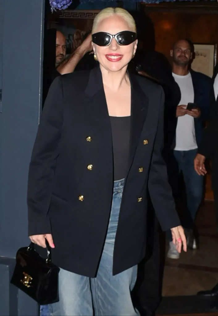 Lady Gaga signs autographs for fans outside her hotel in Paris on July 24, 2024. (PHOTO: VIA PEOPLE, ABACAPRESS / SPLASHNEWS)