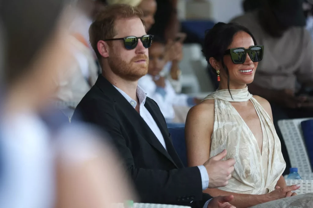 Prince Harry and Meghan Markle at the Ikoyi Polo Club in Lagos, Nigeria on May 12, 2024. (PHOTO: VIA PEOPLE, KOLA SULAIMON/AFP VIA GETTY)