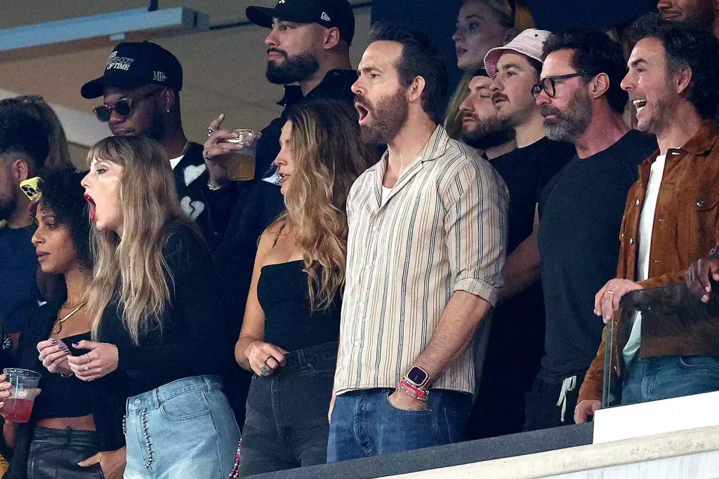 Taylor Swift, Blake Lively, Ryan Reynolds and Hugh Jackman at the Chiefs game on Oct. 1, 2023. (PHOTO: VIA PEOPLE, ELSA/GETTY)