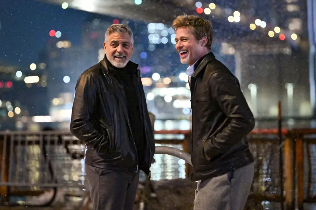 George Clooney and Brad Pitt on the set of 'Wolfs' in February 2023. (PHOTO: VIA PEOPLE, James Devaney/GC Images)