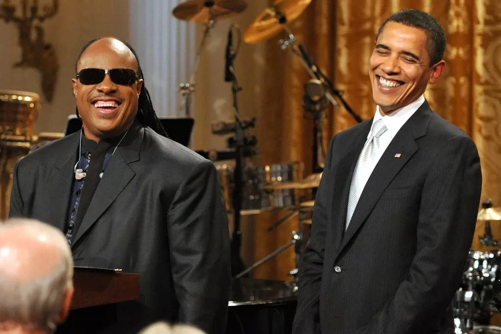 Stevie Wonder and Barack Obama in 2009. (PHOTO: VIA PEOPLE, Ron Sachs-Pool/Getty)